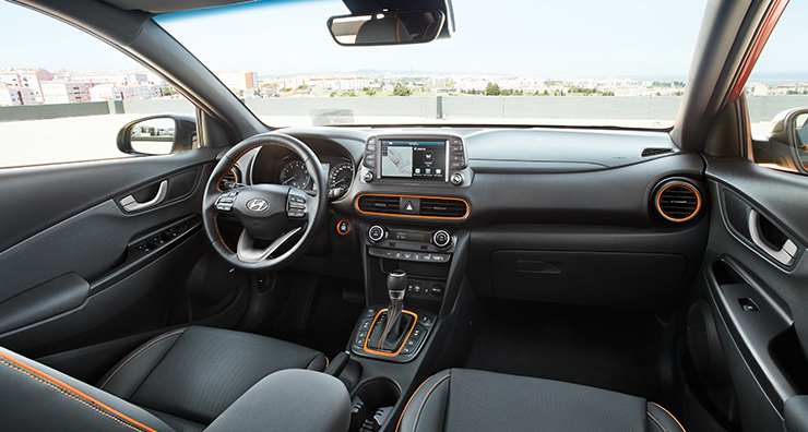 quarter view of orange stitching interior